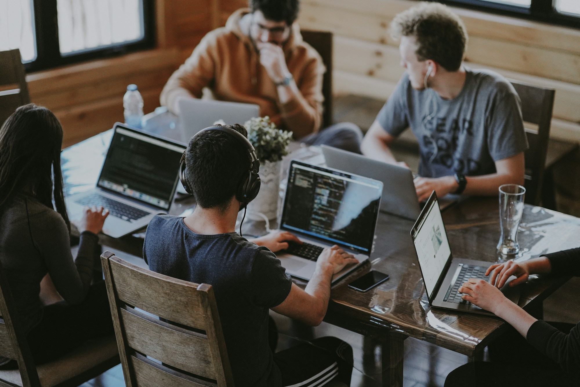 People collaborating on software in a shared workspace